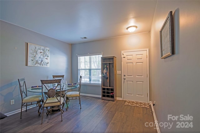 dining area featuring dark hardwood / wood-style floors