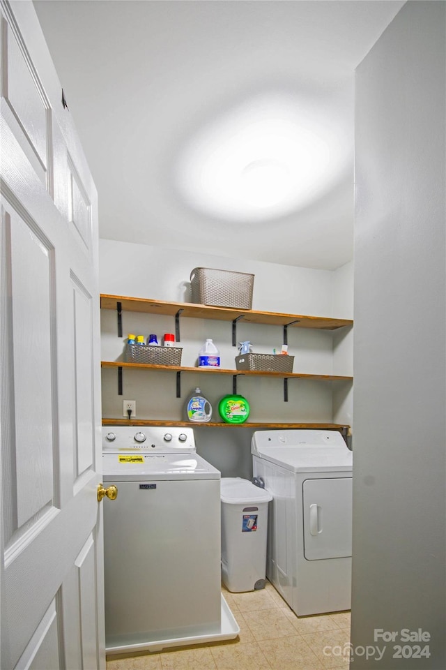 laundry room featuring washing machine and dryer