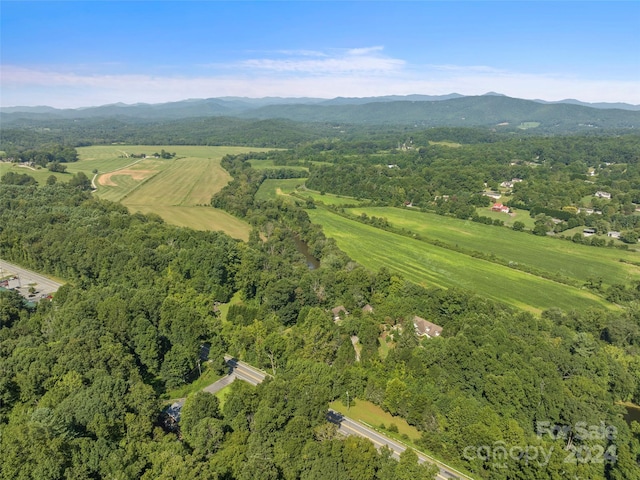 aerial view featuring a mountain view and a rural view