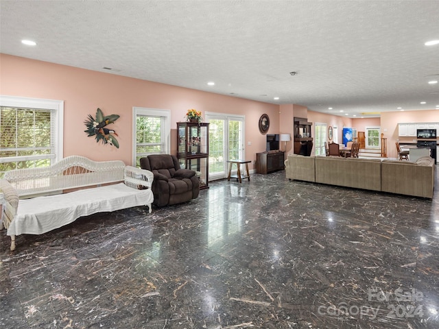 interior space featuring a textured ceiling