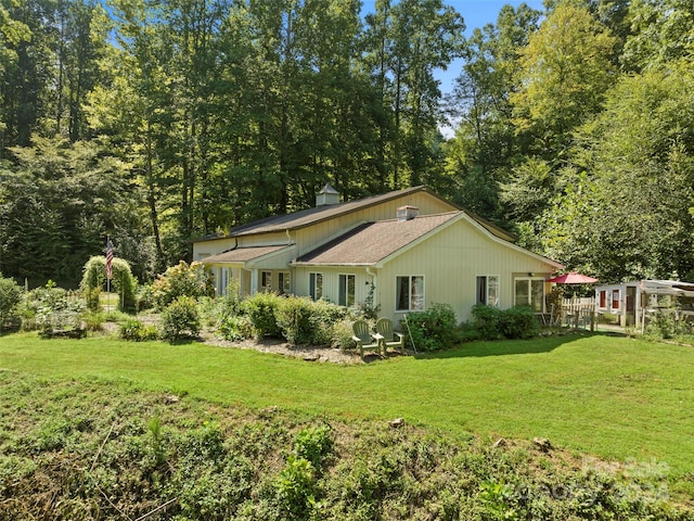 exterior space with a lawn