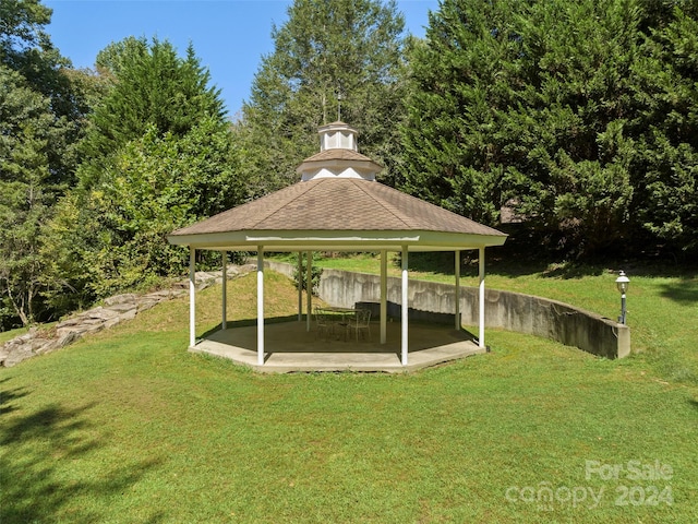 view of community with a yard and a gazebo