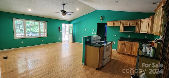 kitchen featuring a textured ceiling, white electric range oven, lofted ceiling, ceiling fan, and light wood-type flooring