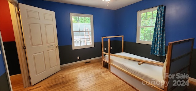 bedroom featuring light hardwood / wood-style floors