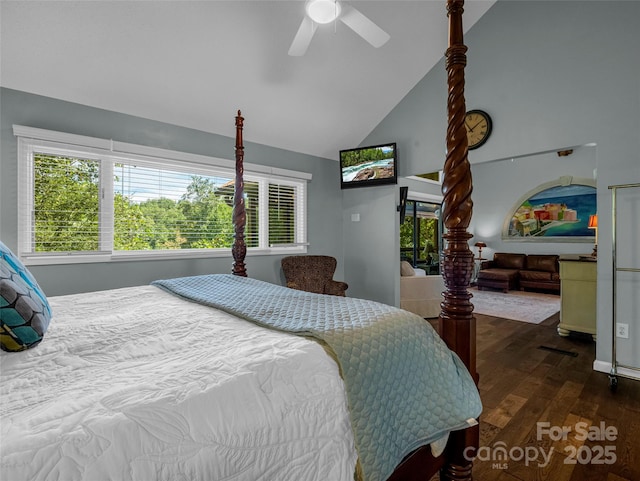 bedroom featuring high vaulted ceiling, wood finished floors, and a ceiling fan