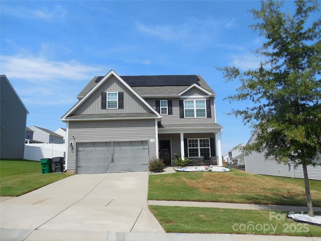 craftsman inspired home featuring a garage, a porch, a front lawn, and solar panels