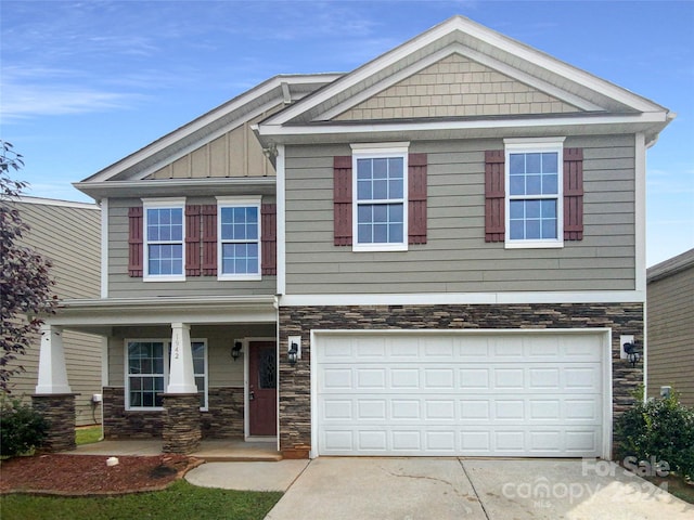 craftsman-style home with a garage