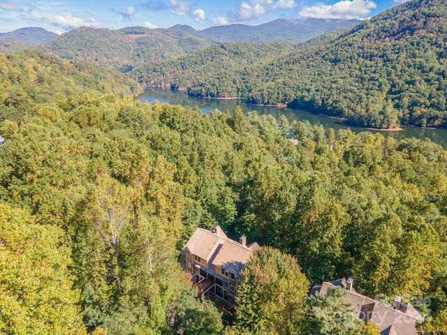 150-2 Saddle Notch Ln, Tuckasegee, NC 28783 - drone / aerial view of a heavily wooded area and a water and mountain view