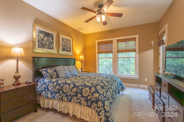150-2 Saddle Notch Ln, Tuckasegee, NC 28783 - carpeted bedroom with baseboards and ceiling fan