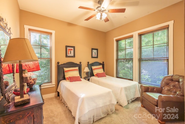 150-2 Saddle Notch Ln, Tuckasegee, NC 28783 - bedroom featuring light colored carpet, a ceiling fan, and baseboards