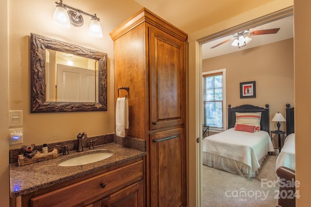 150-2 Saddle Notch Ln, Tuckasegee, NC 28783 - bathroom featuring a ceiling fan, connected bathroom, and vanity