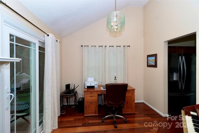 office area featuring dark wood-type flooring, an inviting chandelier, and vaulted ceiling