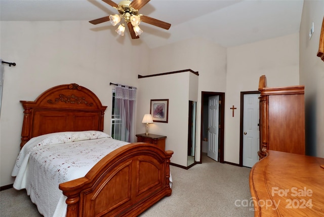 carpeted bedroom with lofted ceiling and ceiling fan