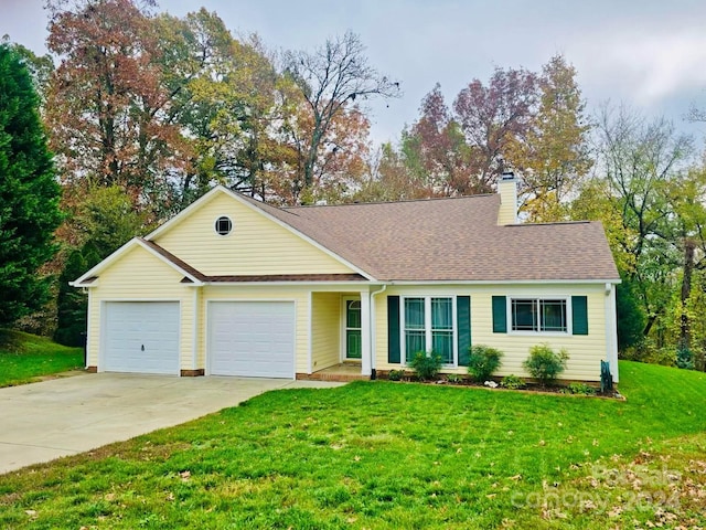 ranch-style house with a front lawn and a garage