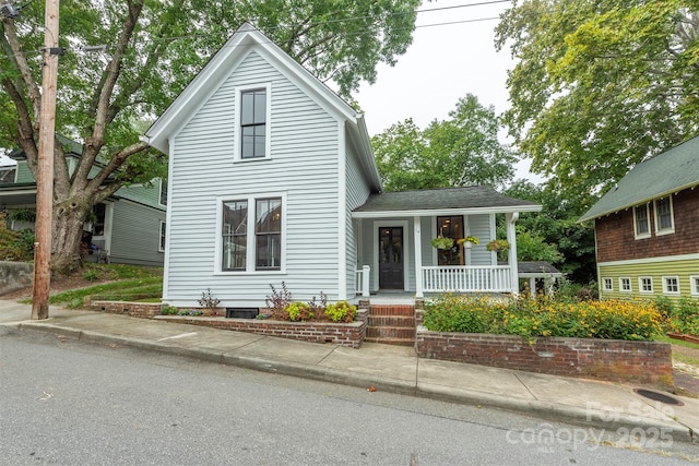 traditional-style home with covered porch