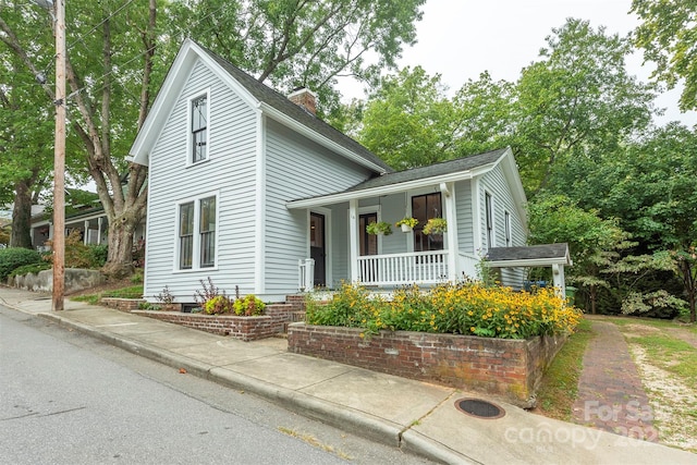 view of front of property featuring covered porch