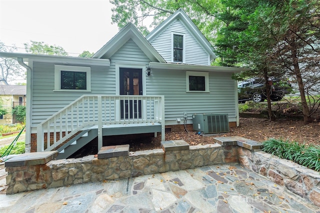 back of house with a patio, central AC unit, and stairway