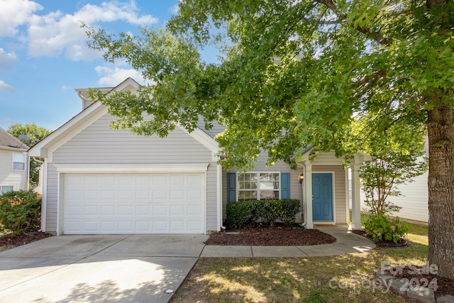 view of front of property featuring a garage