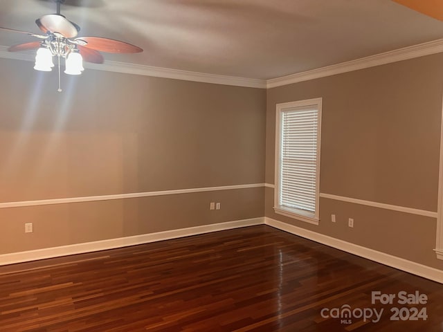 unfurnished room with ceiling fan, dark hardwood / wood-style flooring, and crown molding