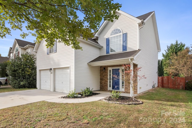 front facade with a front yard and a garage