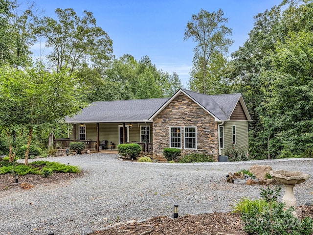 ranch-style home with a porch