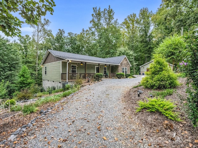 single story home featuring covered porch