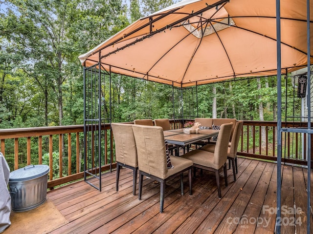 wooden deck with a gazebo