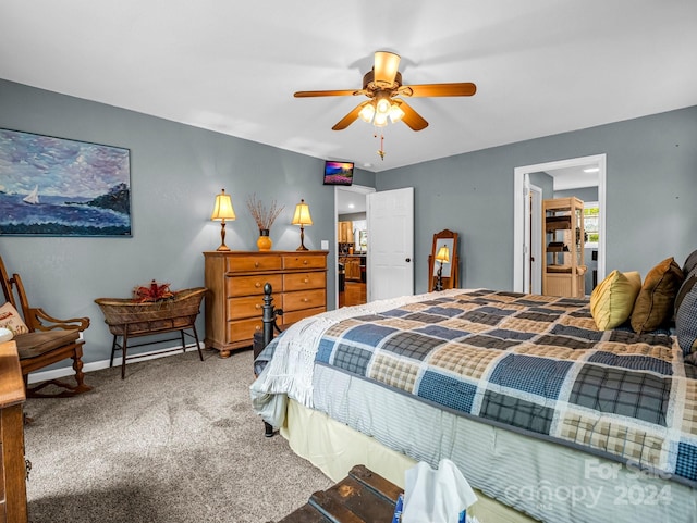 bedroom with ceiling fan and carpet