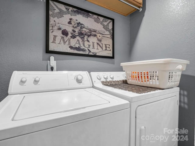 laundry room featuring washer and dryer