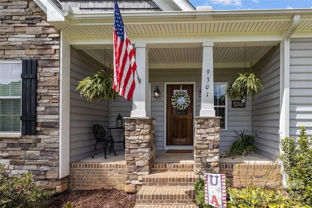 entrance to property with covered porch