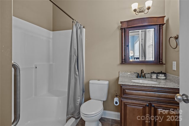 bathroom with vanity, a shower with curtain, and toilet