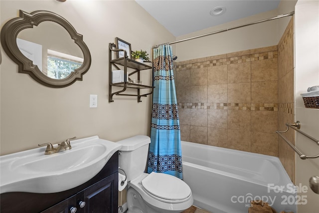 full bathroom with vanity, toilet, and shower / bath combo with shower curtain