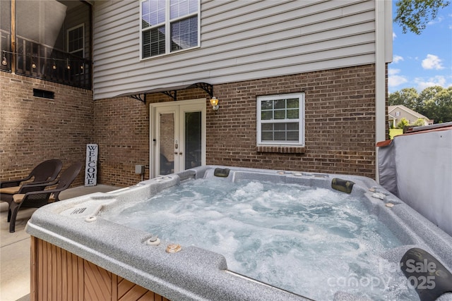 view of patio featuring a hot tub