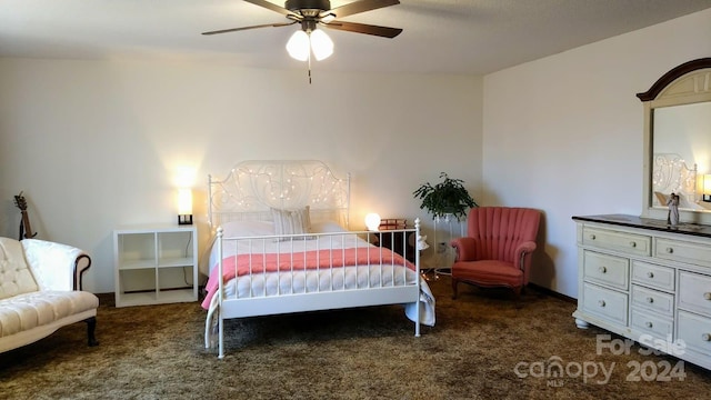 bedroom with dark carpet and ceiling fan