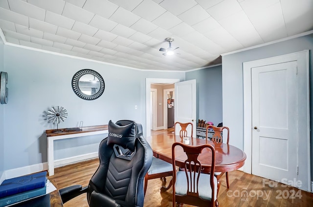 office area featuring crown molding, ceiling fan, and hardwood / wood-style floors