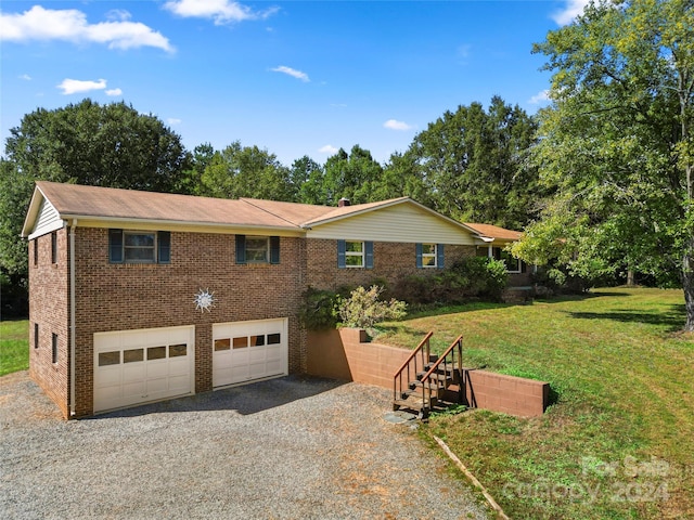 view of property exterior featuring a garage and a lawn