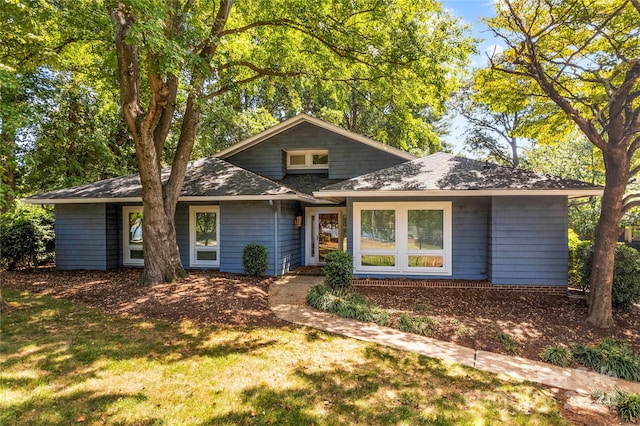 view of front of home with a front lawn