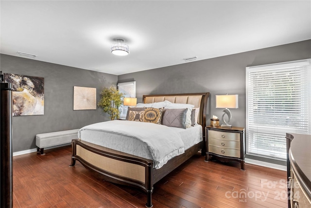 bedroom featuring dark hardwood / wood-style floors