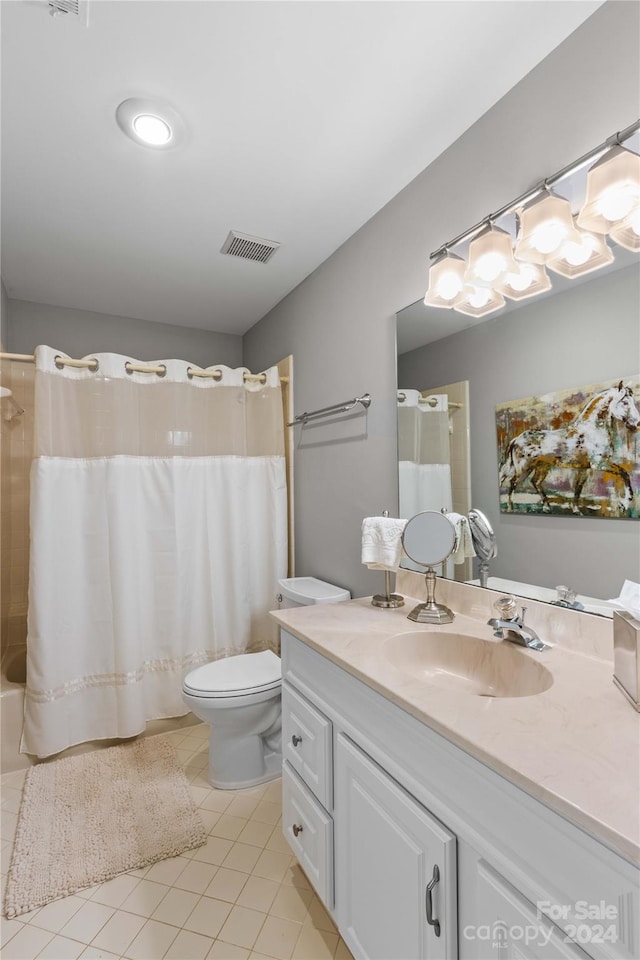 full bathroom featuring tile patterned floors, shower / bathtub combination with curtain, toilet, and vanity