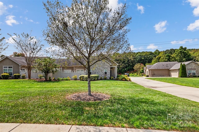 single story home with a garage and a front yard