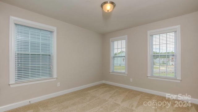 view of carpeted spare room