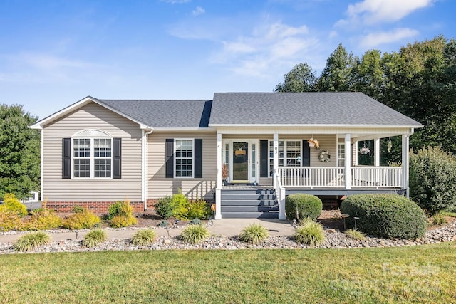 single story home with a porch and a front lawn