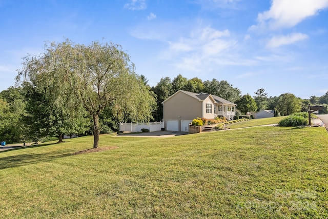 view of yard with a garage