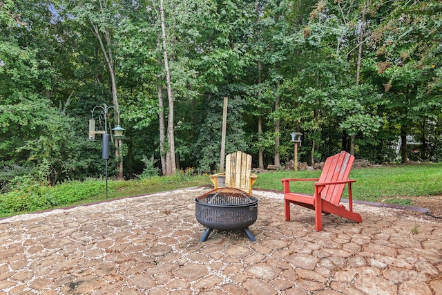 view of patio featuring a fire pit