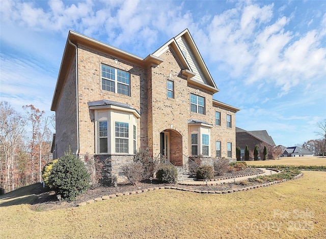 view of front of house with a front yard