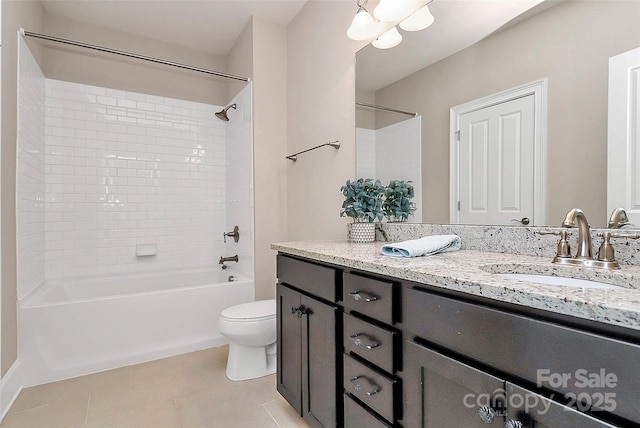 full bathroom with tile patterned flooring, vanity,  shower combination, and toilet