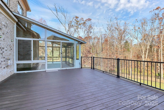 wooden terrace with a sunroom