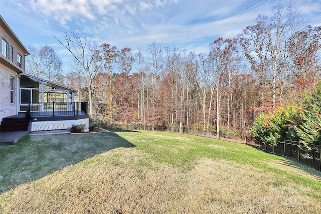 view of yard featuring a deck