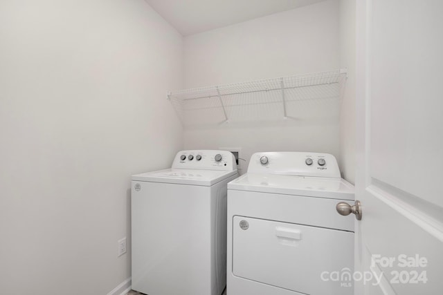 laundry area featuring separate washer and dryer