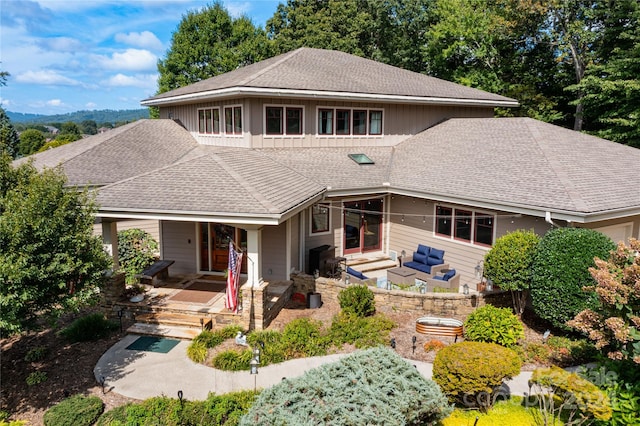 front facade featuring a fire pit and a patio